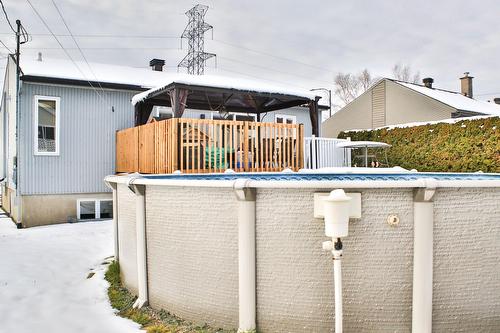 Face arrière - 392 Rue Rocheleau, Québec (Beauport), QC - Outdoor With Above Ground Pool With Exterior