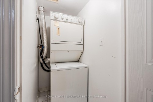 12-4620 Guildwood Way, Mississauga, ON - Indoor Photo Showing Laundry Room
