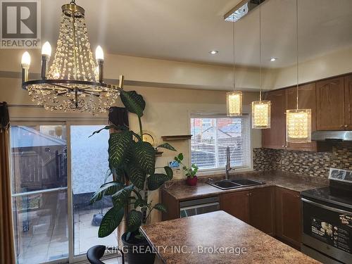 12 Travis Crescent, Brampton, ON - Indoor Photo Showing Kitchen With Double Sink