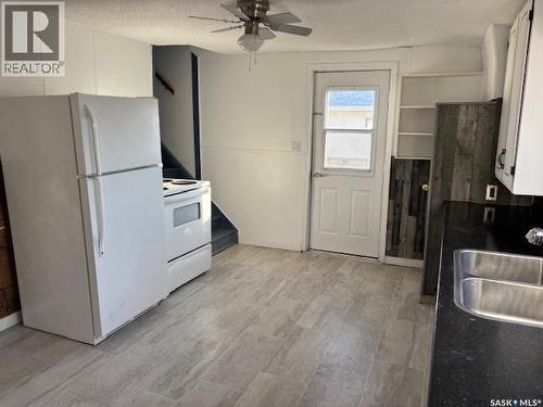 134 2Nd Avenue W, Canora, SK - Indoor Photo Showing Kitchen With Double Sink