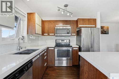 302 120 Phelps Way, Saskatoon, SK - Indoor Photo Showing Kitchen With Double Sink With Upgraded Kitchen
