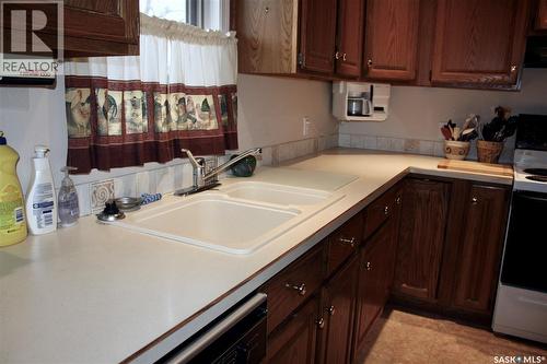 31 Queen Street, Clavet, SK - Indoor Photo Showing Kitchen With Double Sink