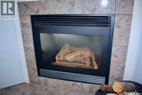 31 Queen Street, Clavet, SK - Indoor Photo Showing Other Room With Fireplace