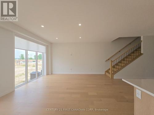 Engineered Hardwood Flooring - 4297 Calhoun Way, London South (South V), ON - Indoor Photo Showing Other Room