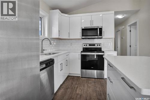 363 Mcarthur Crescent, Saskatoon, SK - Indoor Photo Showing Kitchen With Stainless Steel Kitchen With Upgraded Kitchen
