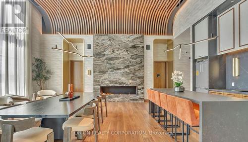 2004 - 3240 William Coltson Avenue, Oakville, ON - Indoor Photo Showing Dining Room With Fireplace
