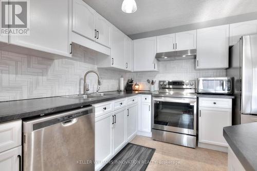 462 Mowat Street E, North Perth, ON - Indoor Photo Showing Kitchen With Double Sink