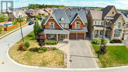 58 Trail Boulevard, Springwater, ON - Outdoor With Facade