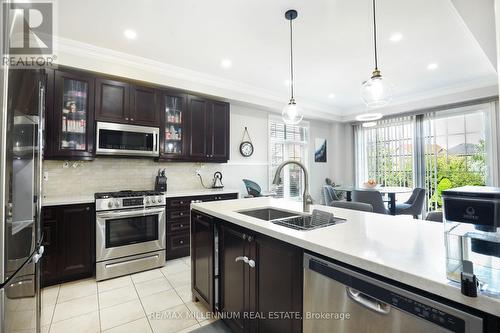 58 Trail Boulevard, Springwater, ON - Indoor Photo Showing Kitchen With Double Sink With Upgraded Kitchen