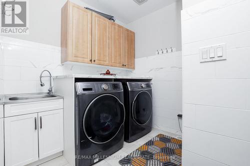 58 Trail Boulevard, Springwater, ON - Indoor Photo Showing Laundry Room