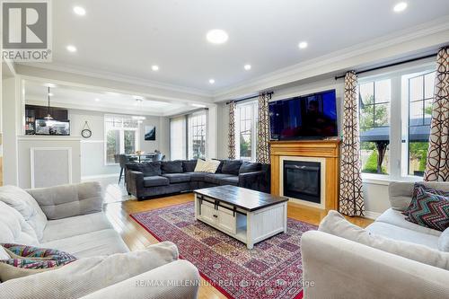 58 Trail Boulevard, Springwater, ON - Indoor Photo Showing Living Room With Fireplace