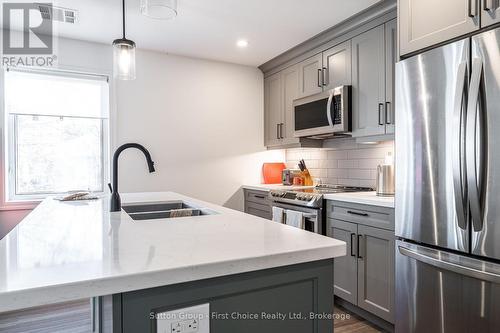 201 - 100 Gordon Street, Stratford, ON - Indoor Photo Showing Kitchen With Double Sink With Upgraded Kitchen