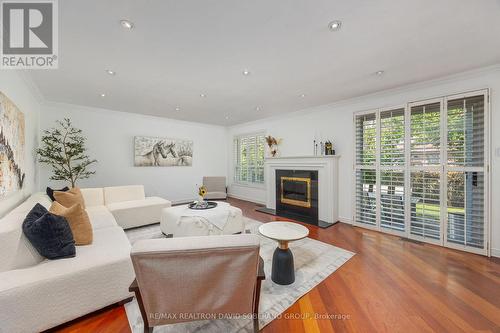 10 Tillingham Keep, Toronto, ON - Indoor Photo Showing Living Room With Fireplace