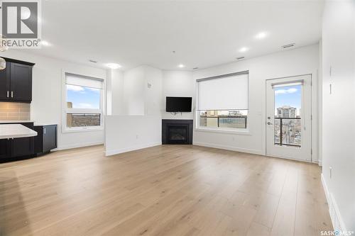 607 2055 Rose Street, Regina, SK - Indoor With Fireplace