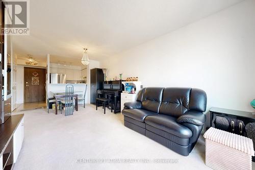 #2002 - 11 Lee Centre Drive, Toronto, ON - Indoor Photo Showing Living Room
