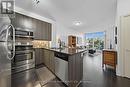 Amazing layout - spacious and bight! - 213 - 1185 The Queensway Avenue, Toronto, ON  - Indoor Photo Showing Kitchen With Stainless Steel Kitchen With Double Sink 