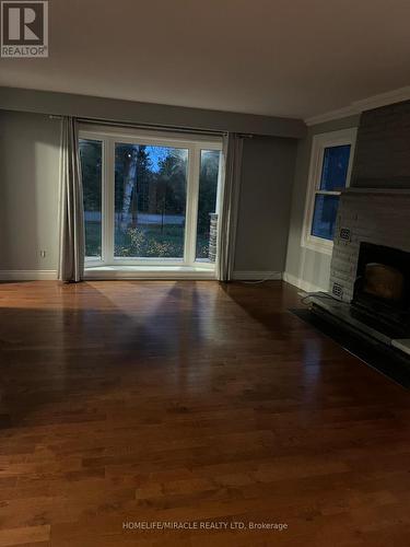 5607 Tenth Line, Erin, ON - Indoor Photo Showing Living Room With Fireplace
