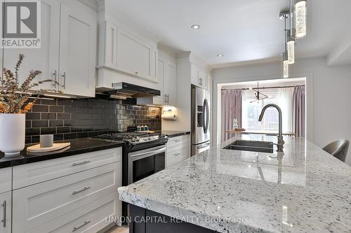 168 Kingsbridge Garden Circle, Mississauga, ON - Indoor Photo Showing Kitchen With Double Sink With Upgraded Kitchen