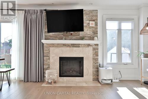 168 Kingsbridge Garden Circle, Mississauga, ON - Indoor Photo Showing Living Room With Fireplace