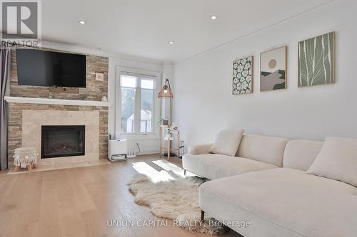 168 Kingsbridge Garden Circle, Mississauga, ON - Indoor Photo Showing Living Room With Fireplace