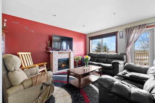 36012 28N Road, Steinbach, MB - Indoor Photo Showing Living Room With Fireplace