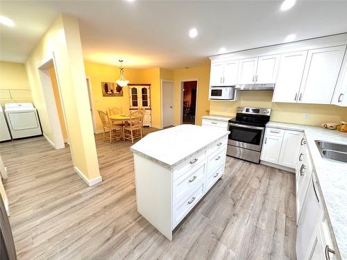 1161 4Th Avenue, Fernie, BC - Indoor Photo Showing Kitchen With Double Sink