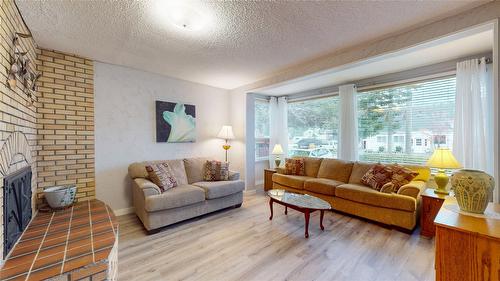 1161 4Th Avenue, Fernie, BC - Indoor Photo Showing Living Room With Fireplace