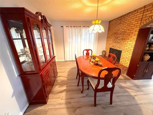 1161 4Th Avenue, Fernie, BC - Indoor Photo Showing Dining Room With Fireplace