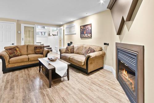 Family room - 3251 Boul. Roland-Therrien, Longueuil (Le Vieux-Longueuil), QC - Indoor Photo Showing Living Room With Fireplace