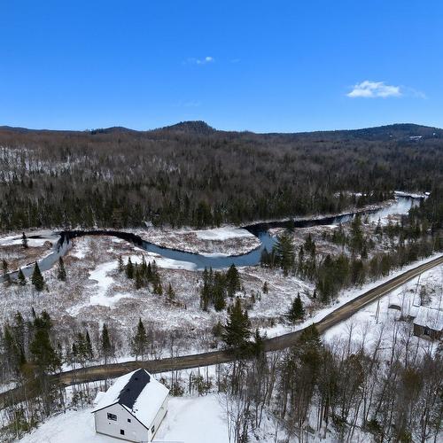 Vue sur l'eau - 101 Allée De La Nature, Sainte-Marguerite-Du-Lac-Masson, QC - Outdoor With View