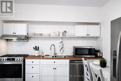 206 Bathurst Street, Toronto, ON - Indoor Photo Showing Kitchen With Double Sink