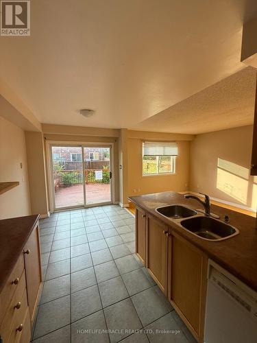 10 Wuthering Heights Road, Toronto, ON - Indoor Photo Showing Kitchen With Double Sink