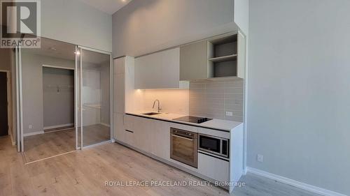 101 - 7890 Jane Street, Vaughan, ON - Indoor Photo Showing Kitchen With Upgraded Kitchen