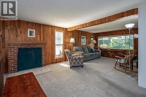 205 6Th Avenue, Castlegar, BC - Indoor Photo Showing Living Room With Fireplace