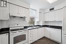 200 - 28 Pemberton Avenue, Toronto, ON  - Indoor Photo Showing Kitchen With Double Sink 