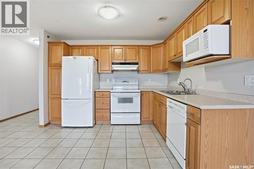 405 205 Mcintyre Street N, Regina, SK - Indoor Photo Showing Kitchen With Double Sink