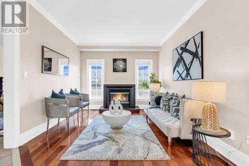 1048 Zimmerman Crescent, Milton, ON - Indoor Photo Showing Living Room With Fireplace