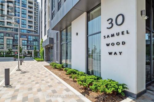 413 - 30 Samuel Wood Way, Toronto, ON - Outdoor With Facade