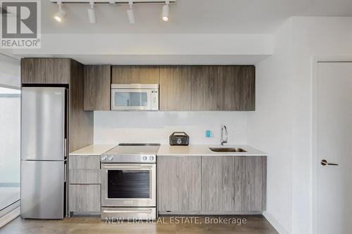 413 - 30 Samuel Wood Way, Toronto, ON - Indoor Photo Showing Kitchen