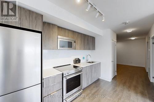413 - 30 Samuel Wood Way, Toronto, ON - Indoor Photo Showing Kitchen