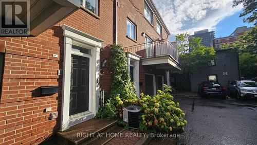 Front Exterior in Summer - 4 Thorburn Private, Ottawa, ON - Outdoor With Balcony