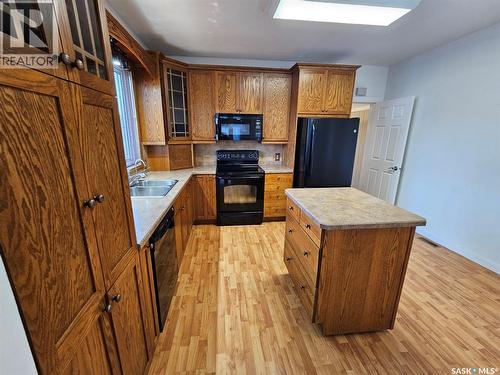 201 Souris Avenue E, Carlyle, SK - Indoor Photo Showing Kitchen With Double Sink