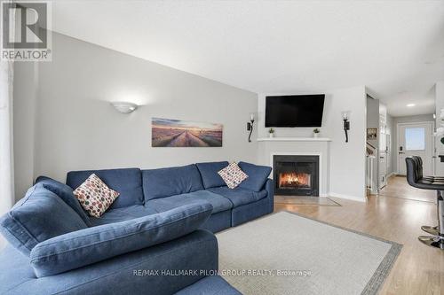 420 Valade Crescent, Ottawa, ON - Indoor Photo Showing Living Room With Fireplace