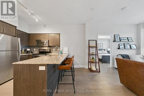 406 - 65 Speers Road, Oakville, ON - Indoor Photo Showing Kitchen With Stainless Steel Kitchen