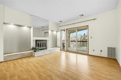 305 3275 Pembina Highway, Winnipeg, MB - Indoor Photo Showing Other Room With Fireplace