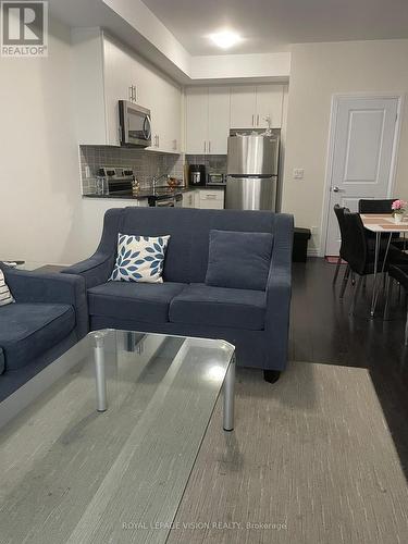 310 - 2635 William Jackson Drive, Pickering, ON - Indoor Photo Showing Living Room