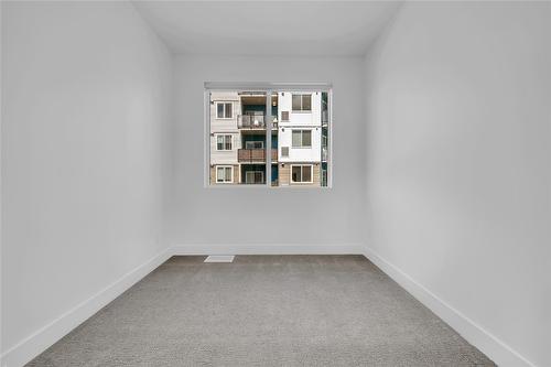 102C-3642 Mission Springs Drive, Kelowna, BC - Indoor Photo Showing Other Room