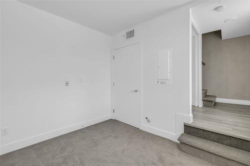 103C-3642 Mission Springs Drive, Kelowna, BC - Indoor Photo Showing Other Room