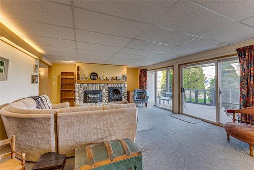 14114 Juniper Drive, Coldstream, BC - Indoor Photo Showing Other Room With Fireplace