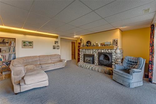 14114 Juniper Drive, Coldstream, BC - Indoor Photo Showing Living Room With Fireplace